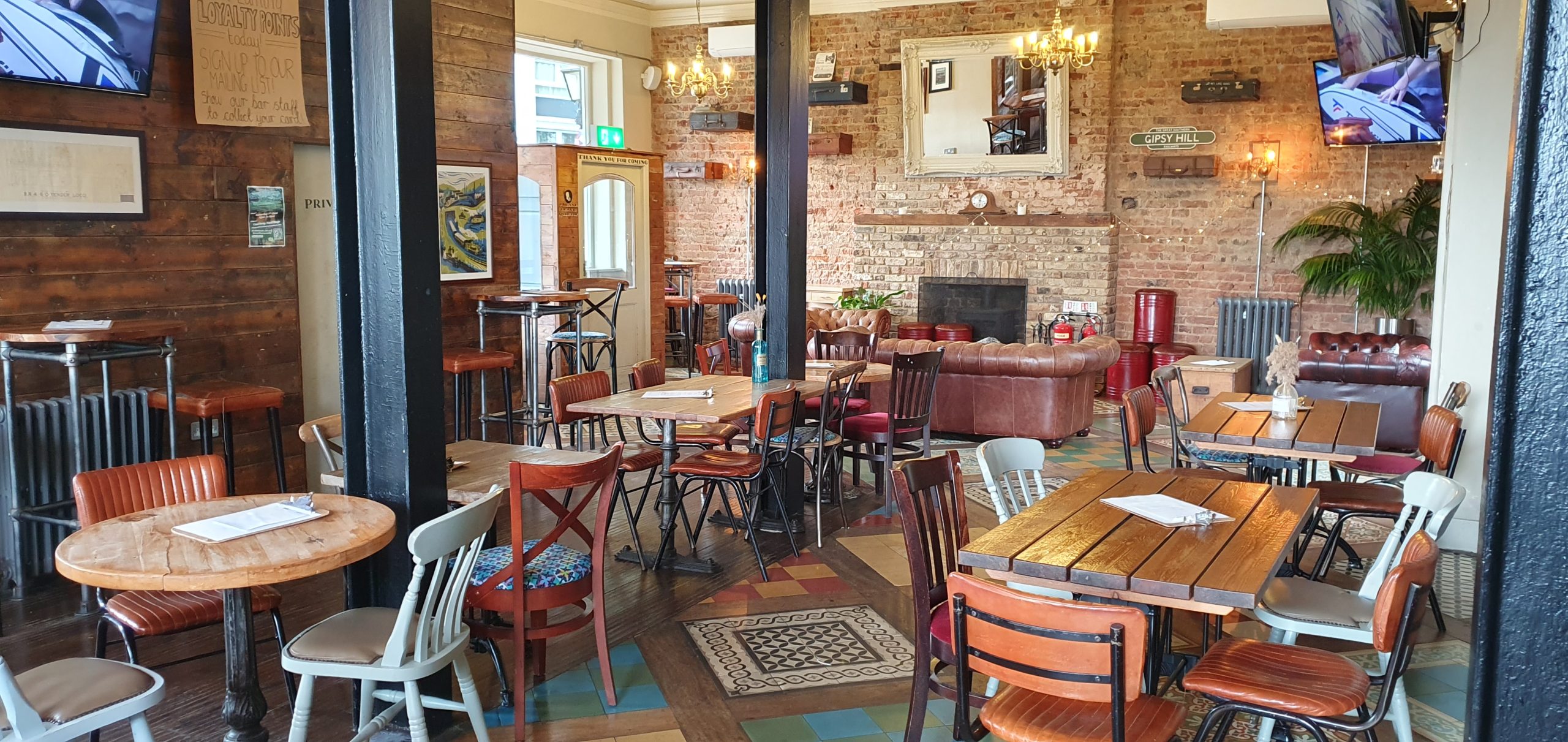The Great Southern — fireplace and seating